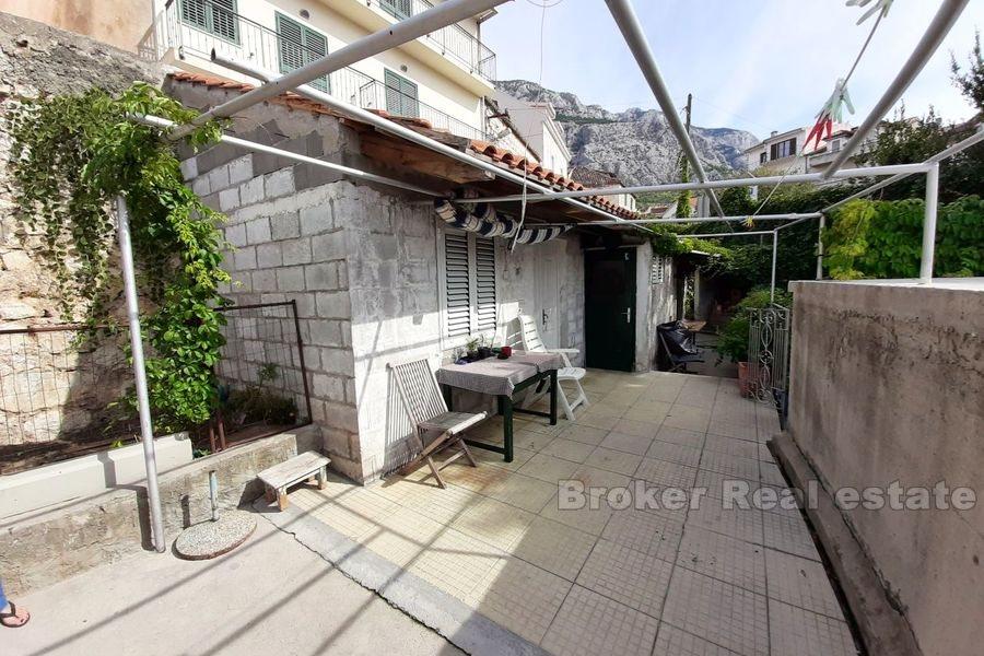 Two-storey apartment with private garden