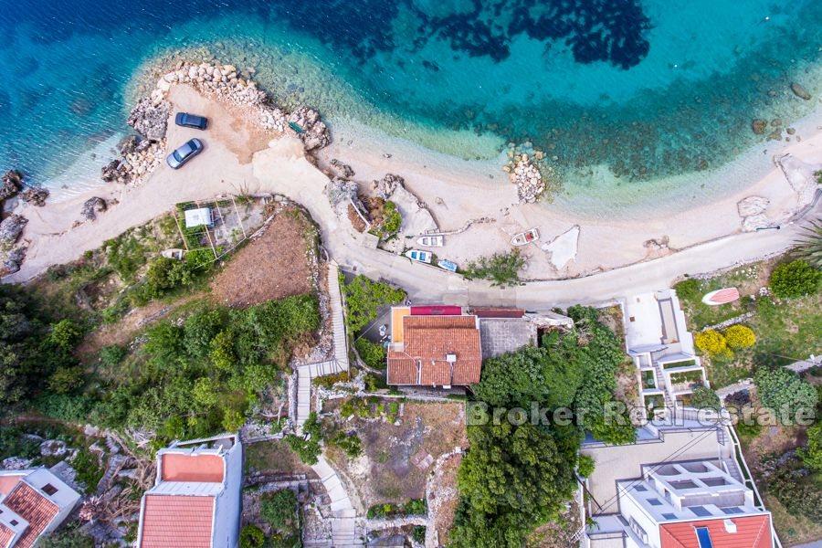 Maison jumelée au premier rang de la mer