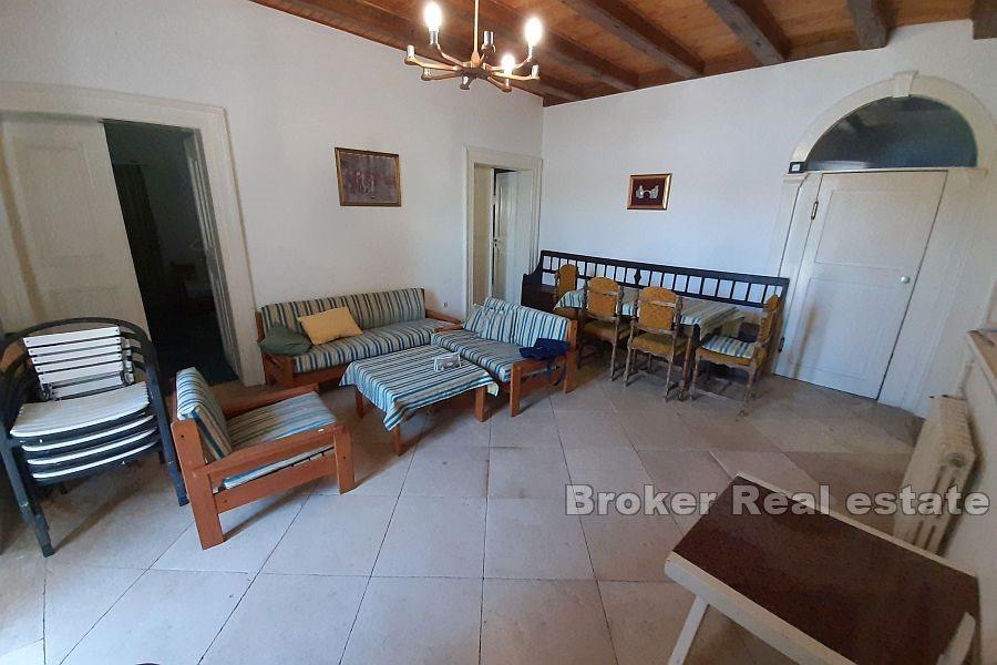 Stone captain's house by the sea