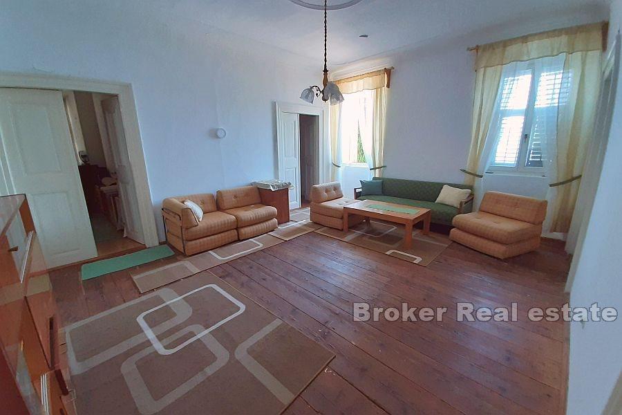 Stone captain's house by the sea