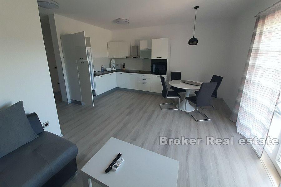 Apartment building in the first row by the sea