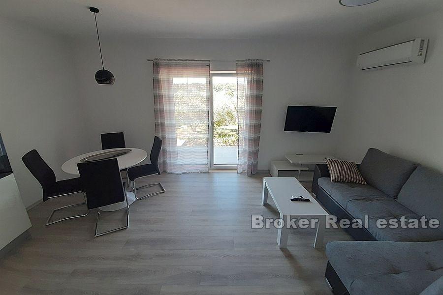 Immeuble d'appartements au premier rang en bord de mer