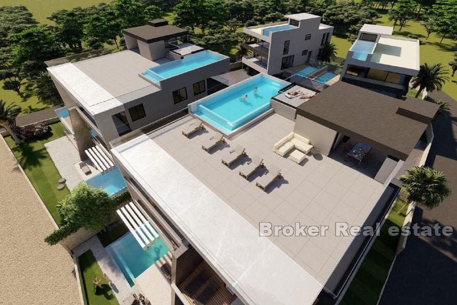 Apartment with pool first row to the sea