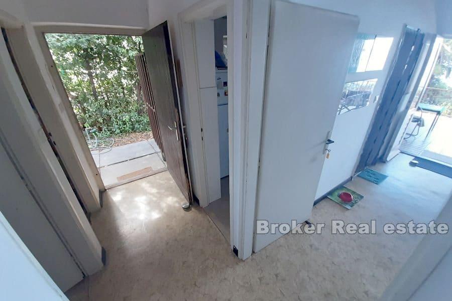 House in the first row by the sea