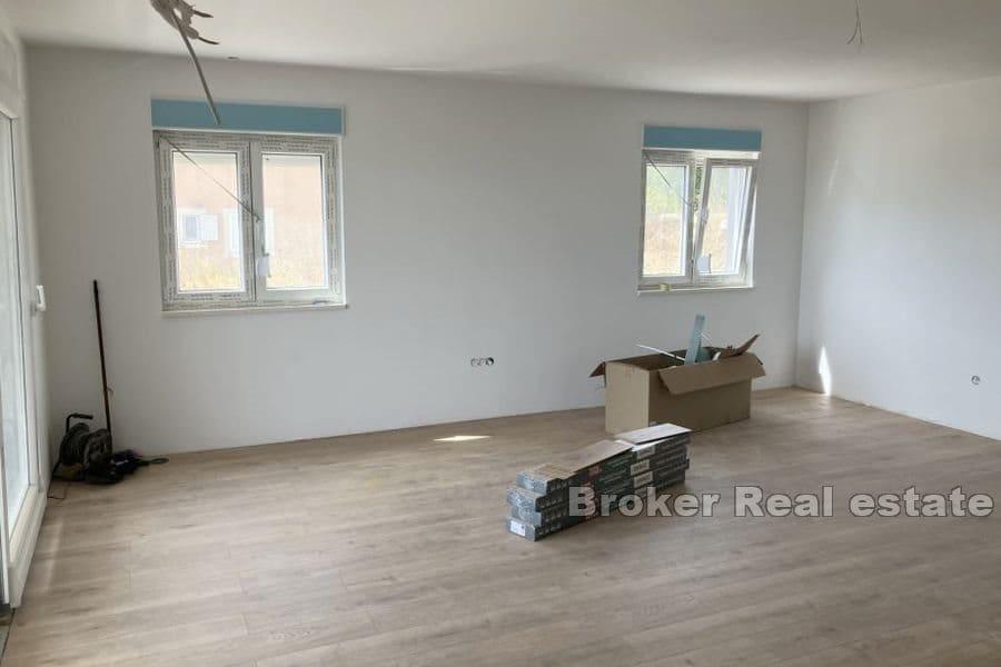 Byt s výhledem na moře, novostavba