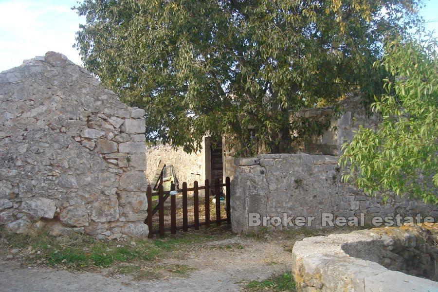 Building plot with ruins