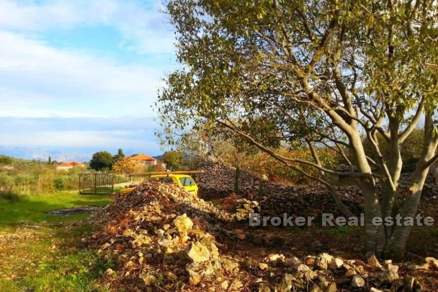 Building plot with ruins