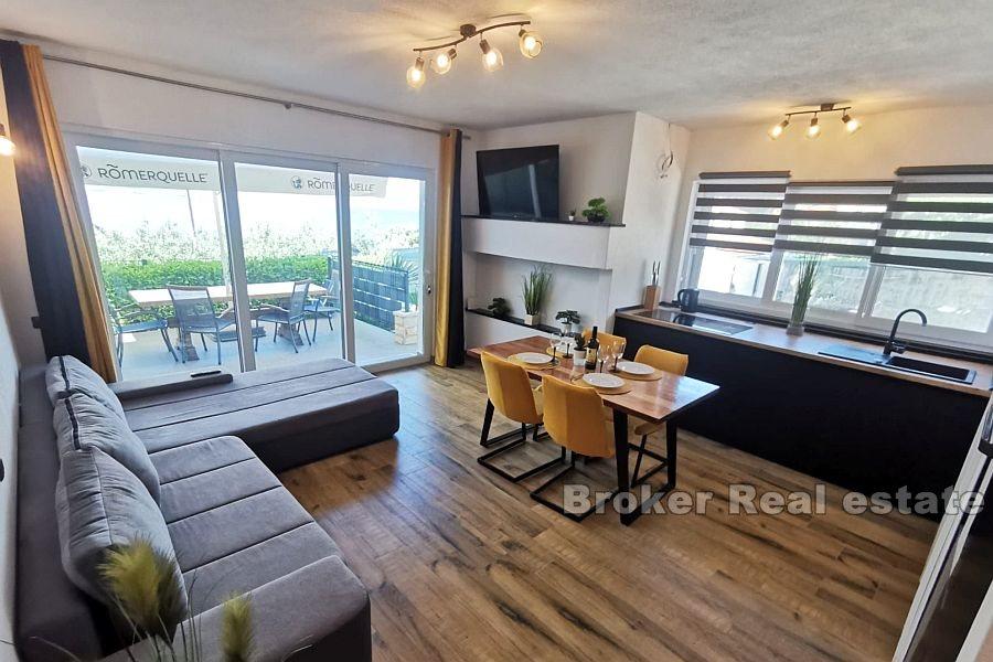 Casa a un piano con vista sul mare aperto