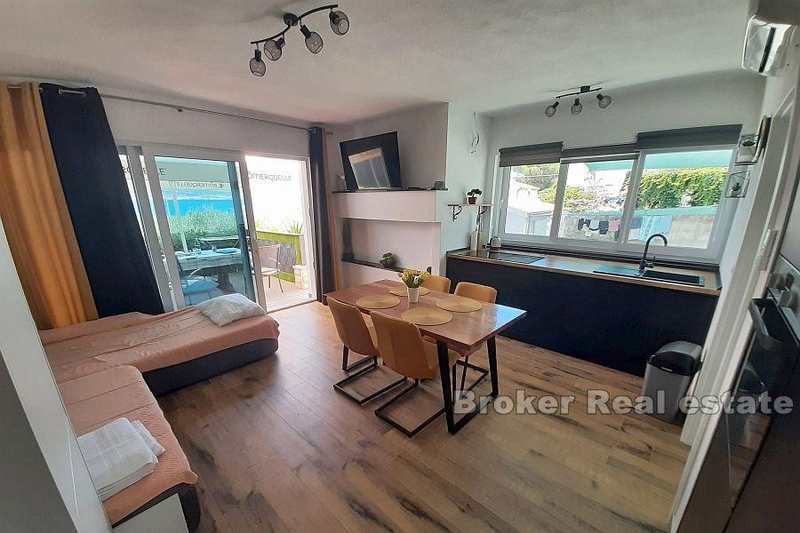 Casa a un piano con vista sul mare aperto