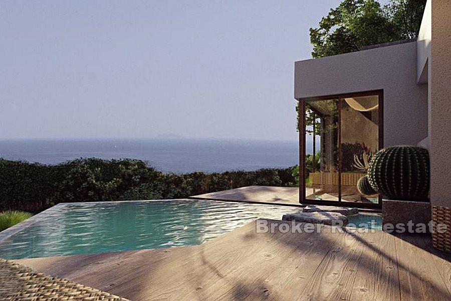 Land with sea view and project