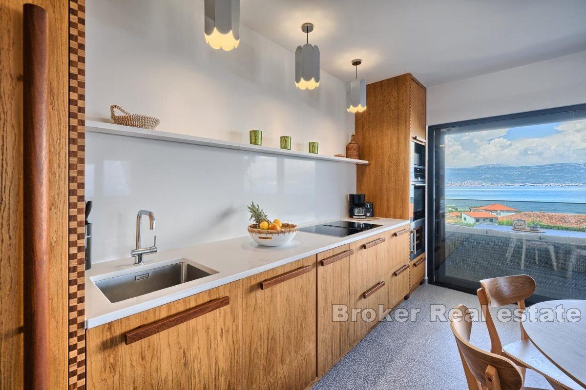 Modern apartment with pool and open sea view