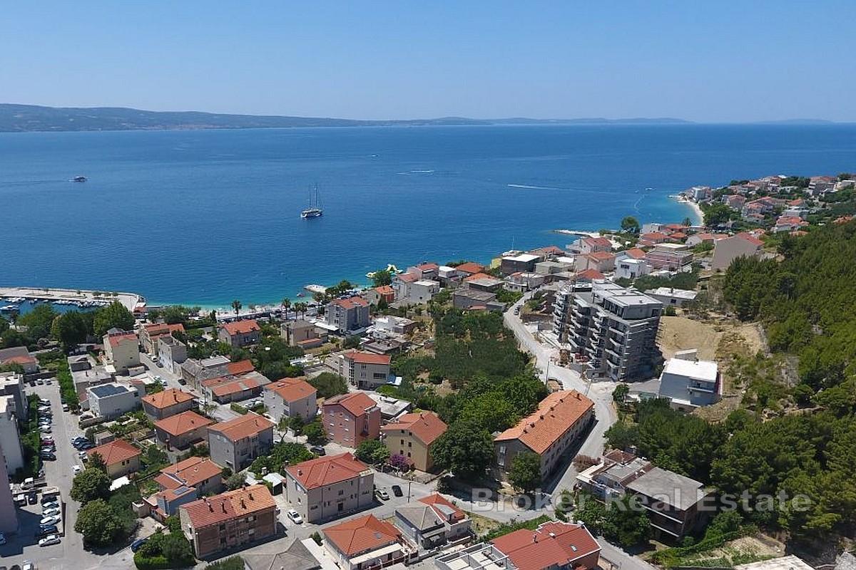 Maison jumelée à rénover dans un bon emplacement