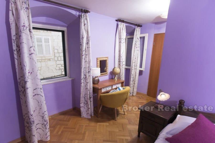 Center, house on four floors