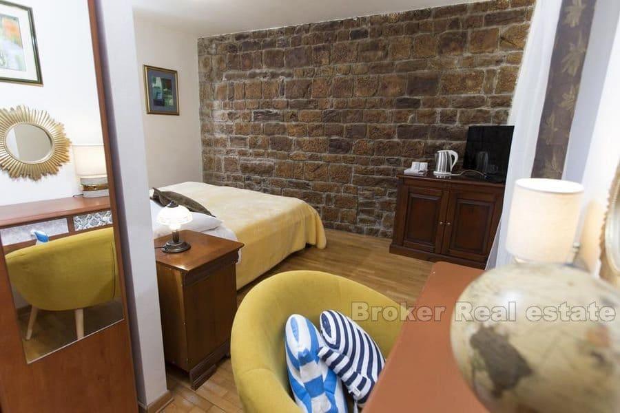 Senter, hus i fire etasjer