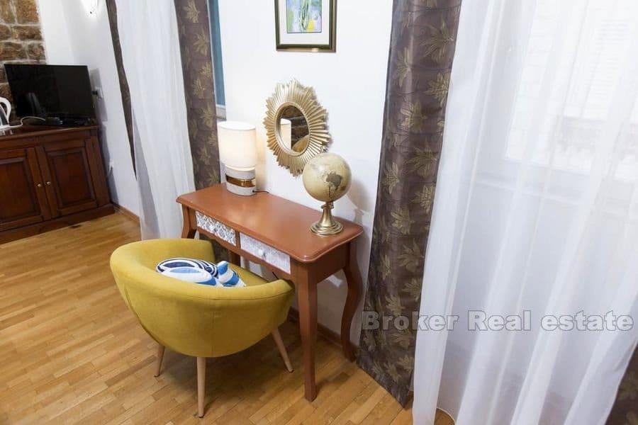 Senter, hus i fire etasjer