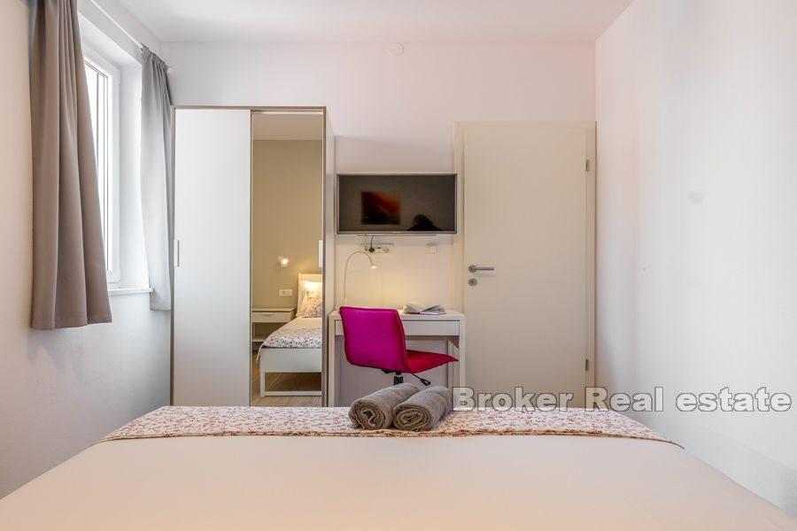 Moderno appartamento con due camere da letto nel centro della città