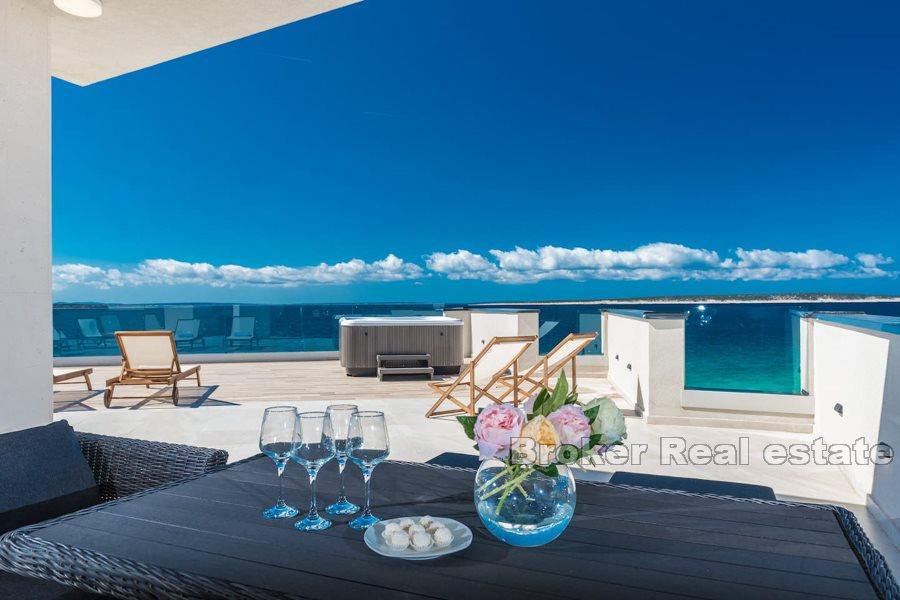 Penthouse located in first row by the sea