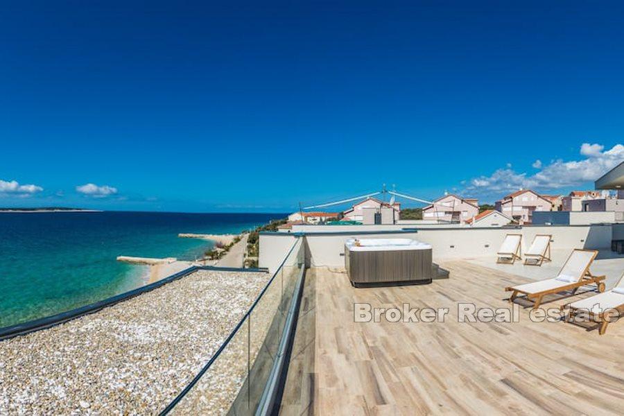 Penthouse located in first row by the sea