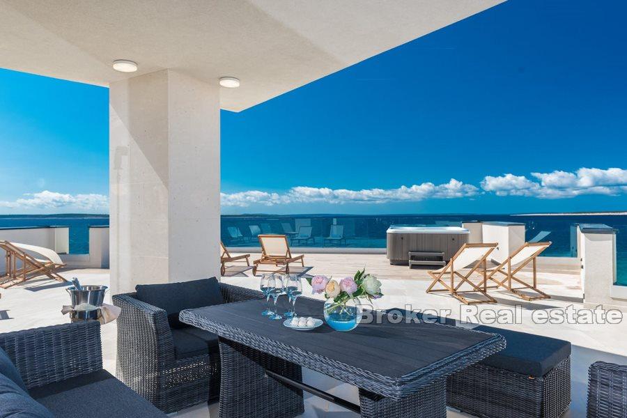 Penthouse located in first row by the sea