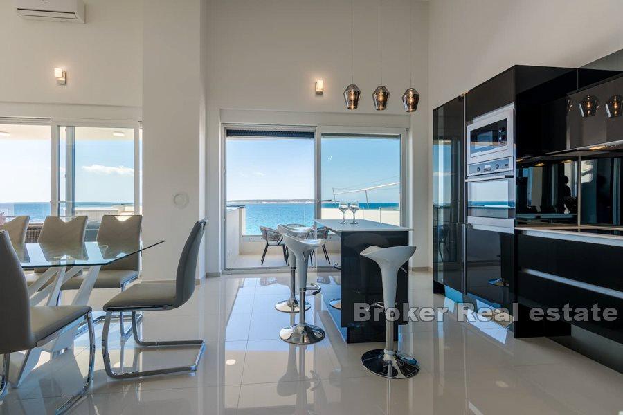 Penthouse located in first row by the sea