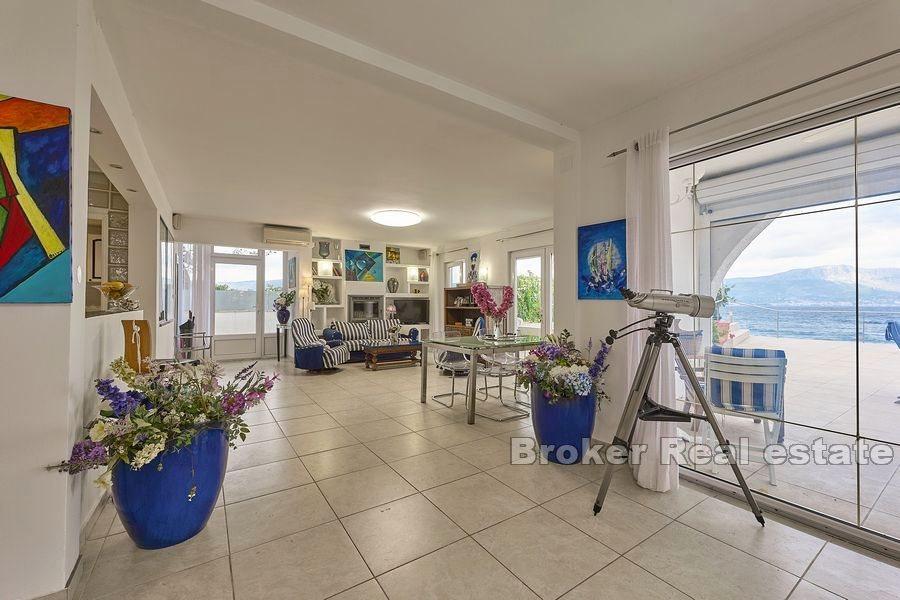 Villa on the beach with spacious terraces and sea view