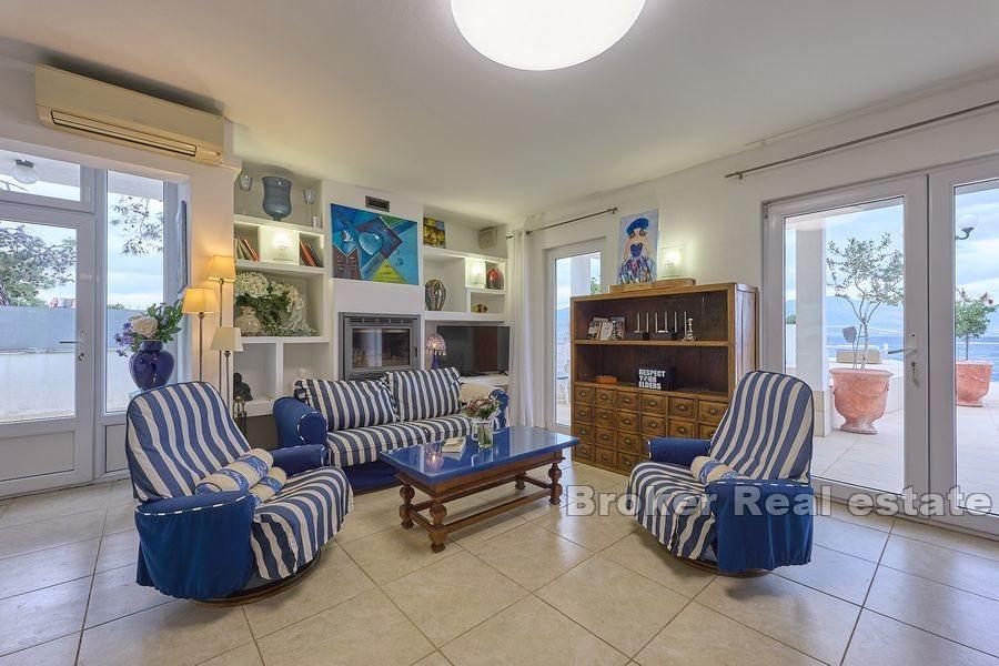 Villa on the beach with spacious terraces and sea view
