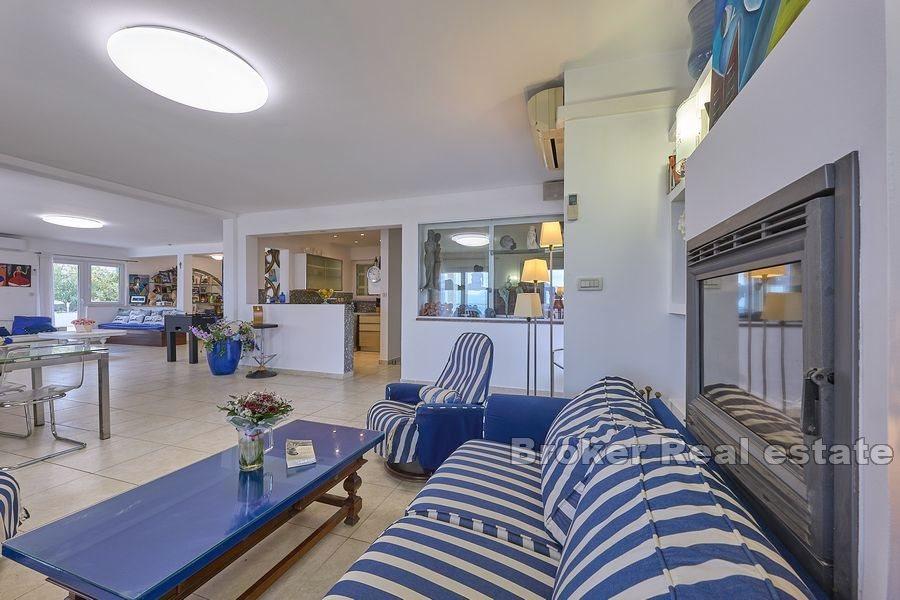 Villa on the beach with spacious terraces and sea view
