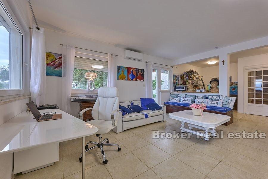 Villa on the beach with spacious terraces and sea view