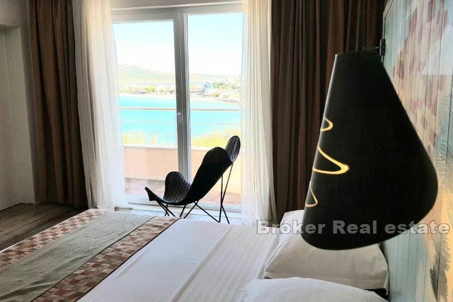 House/mini hotel first row to the sea