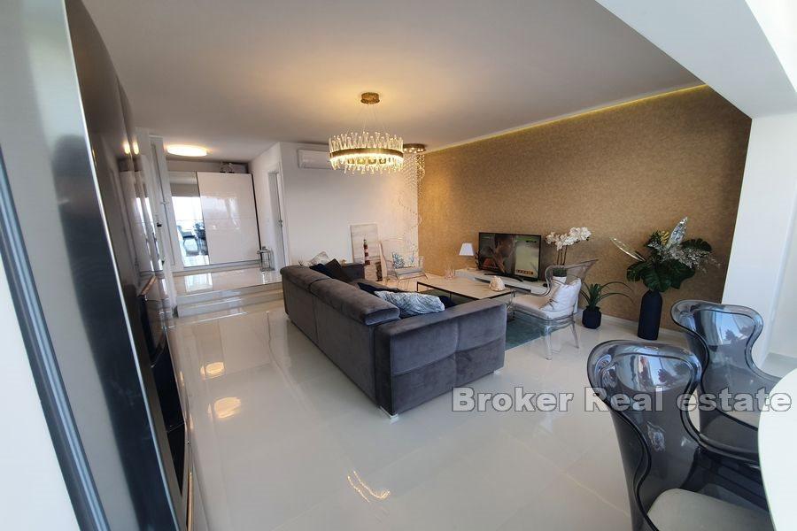 House in the second row from the sea