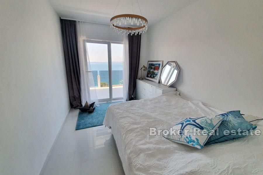 House in the second row from the sea