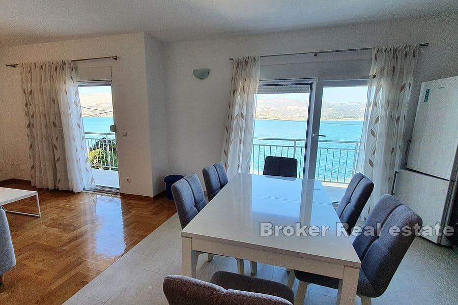 House with apartments next to the beach and the sea