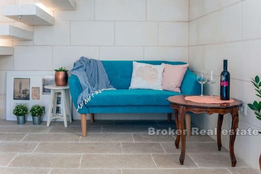 Stone house near the waterfront and the sea