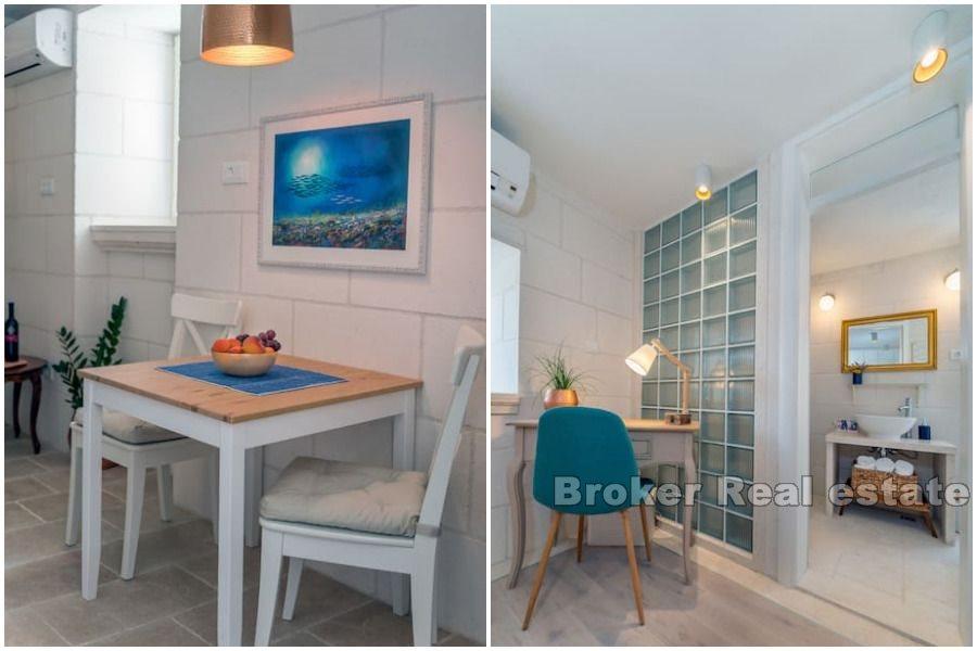 Stone house near the waterfront and the sea