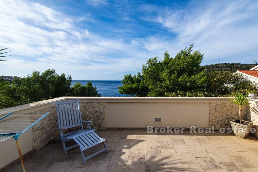 Stone house in the second row to the sea