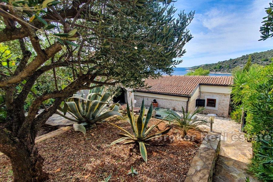 Stone house in the second row to the sea