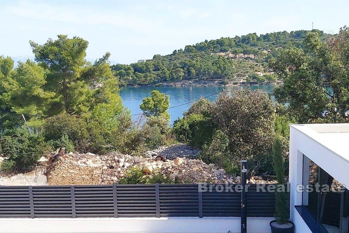 Newly built villa with a pool and a sea view