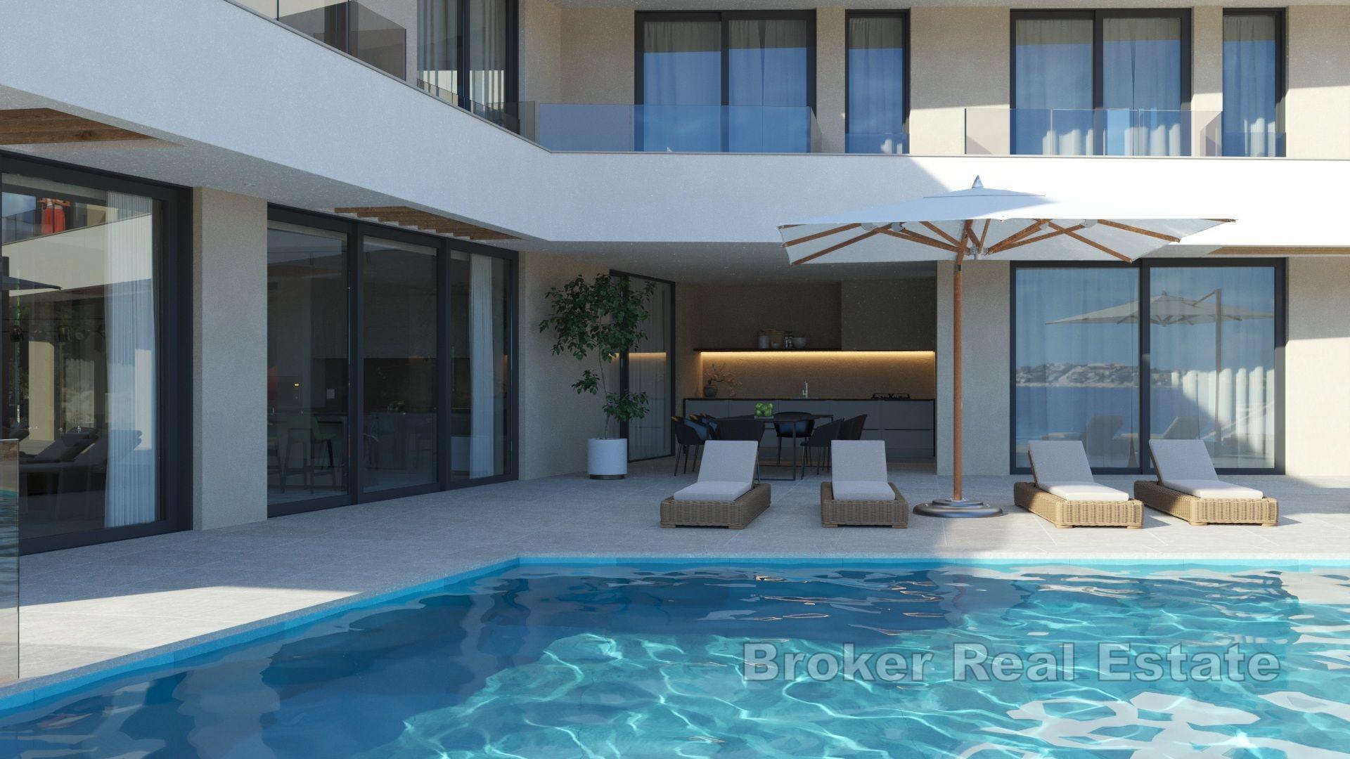 Modern villa with pool, second row from the sea