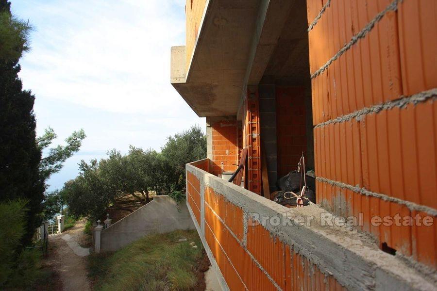 Unfinished house first row to the sea