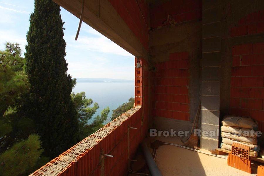 Unfinished house first row to the sea