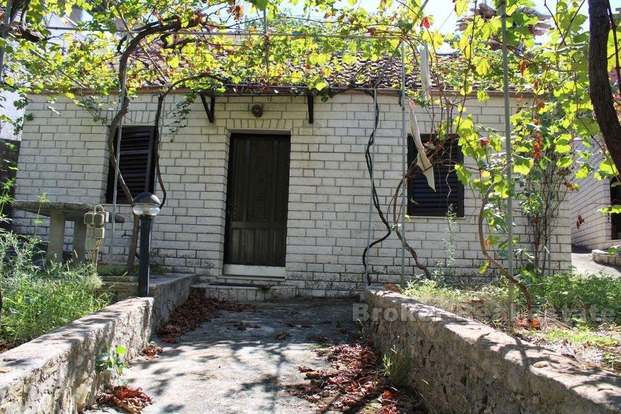 Two stone ground floor houses