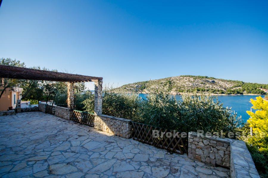 House on attractive location, first row to the sea