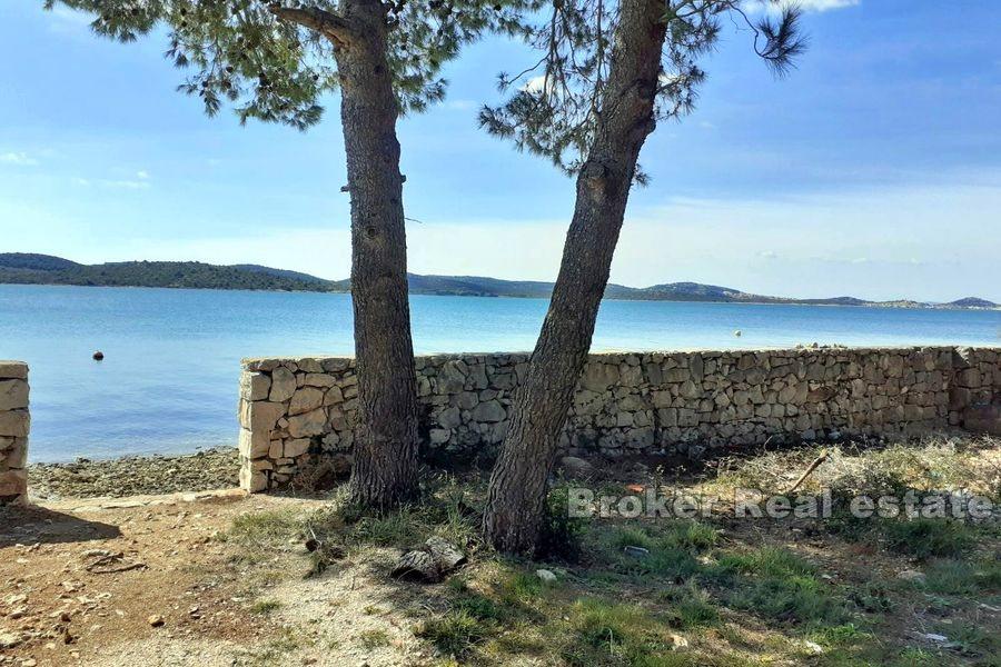 Attractive building land first row to the sea