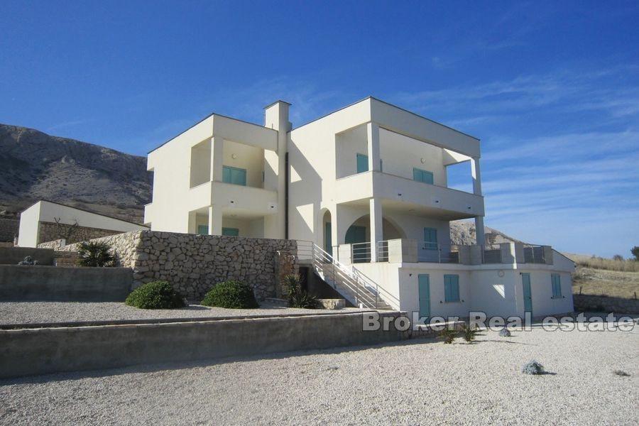 Modernly designed villa, first row to the sea