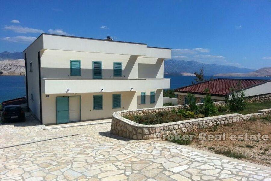 Modernly designed villa, first row to the sea