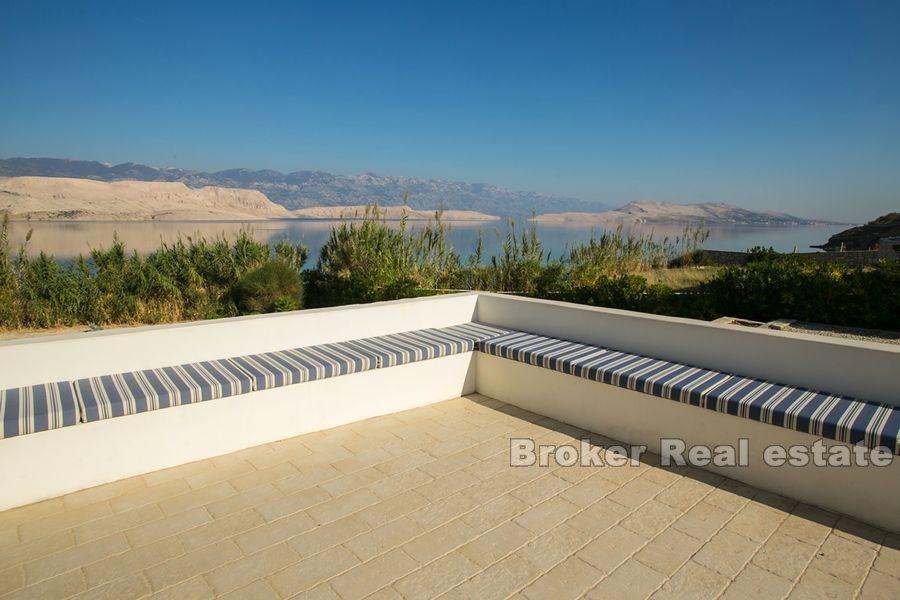 Modernly designed villa, first row to the sea