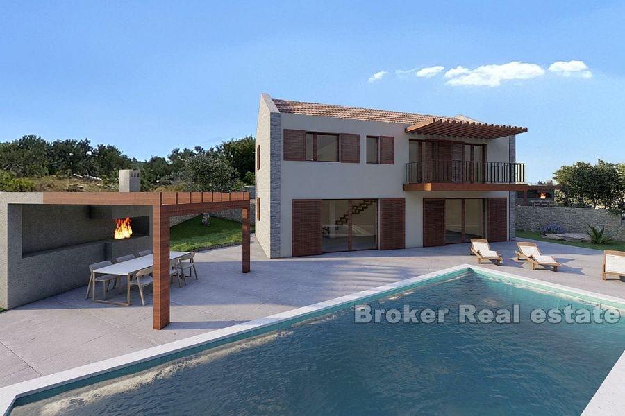 Villa under construction with pool and sea view