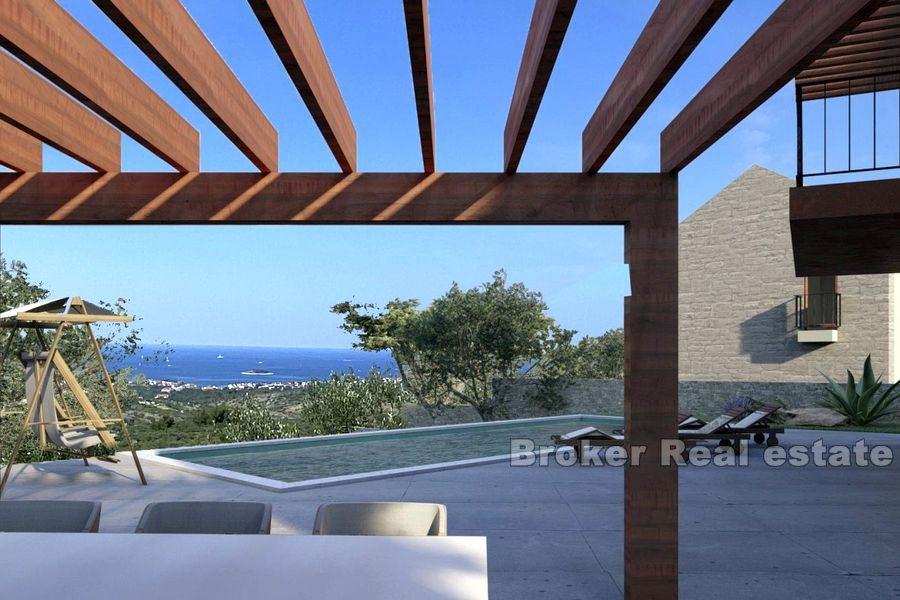 Vila ve výstavbě s výhledem na bazén a moře