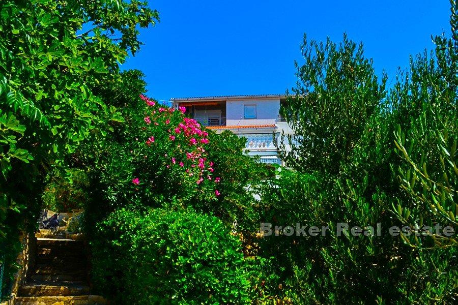 House, first row to the sea, by the beach.