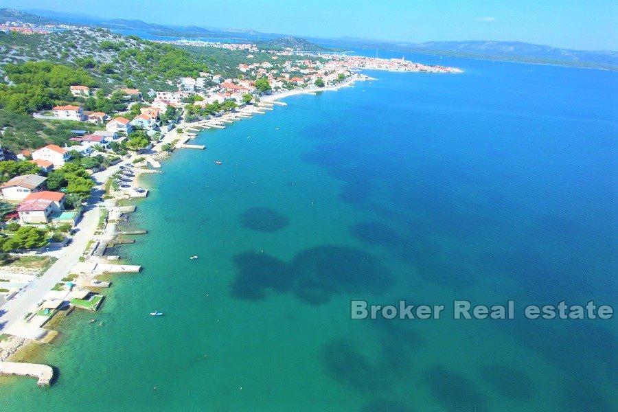 Two houses first row to the sea